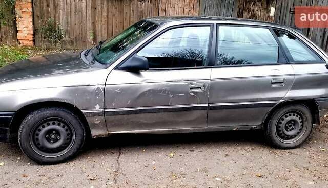 Серый Опель Астра, объемом двигателя 1.4 л и пробегом 280 тыс. км за 1350 $, фото 4 на Automoto.ua