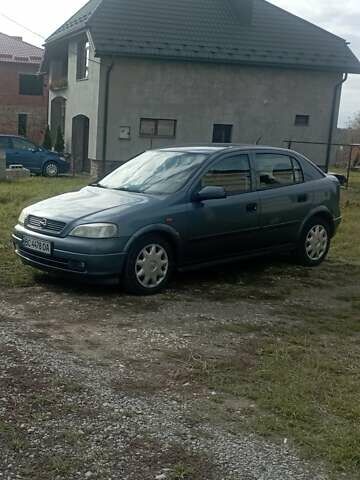 Серый Опель Астра, объемом двигателя 1.6 л и пробегом 193 тыс. км за 3400 $, фото 18 на Automoto.ua