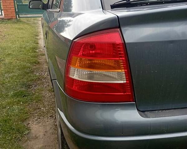 Серый Опель Астра, объемом двигателя 1.6 л и пробегом 193 тыс. км за 3400 $, фото 8 на Automoto.ua