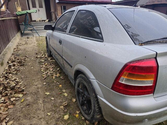 Серый Опель Астра, объемом двигателя 1.6 л и пробегом 400 тыс. км за 750 $, фото 4 на Automoto.ua