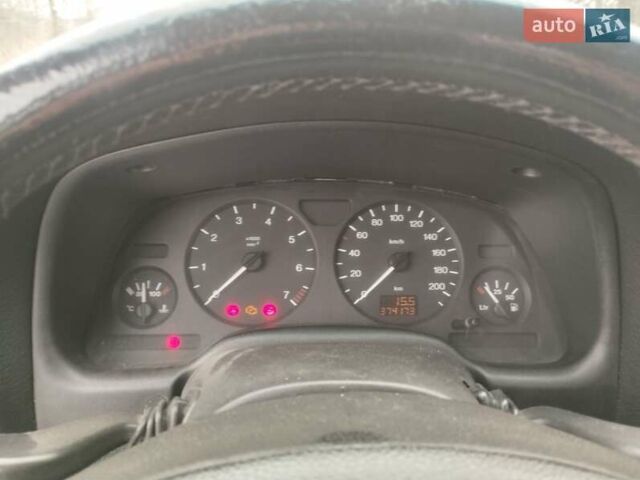 Серый Опель Астра, объемом двигателя 2 л и пробегом 374 тыс. км за 2550 $, фото 2 на Automoto.ua