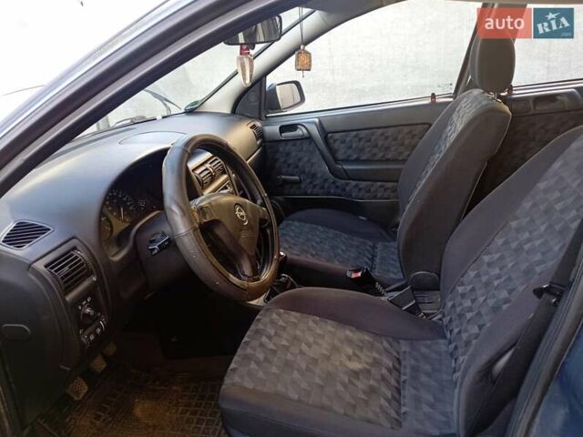 Серый Опель Астра, объемом двигателя 1.6 л и пробегом 193 тыс. км за 3400 $, фото 12 на Automoto.ua