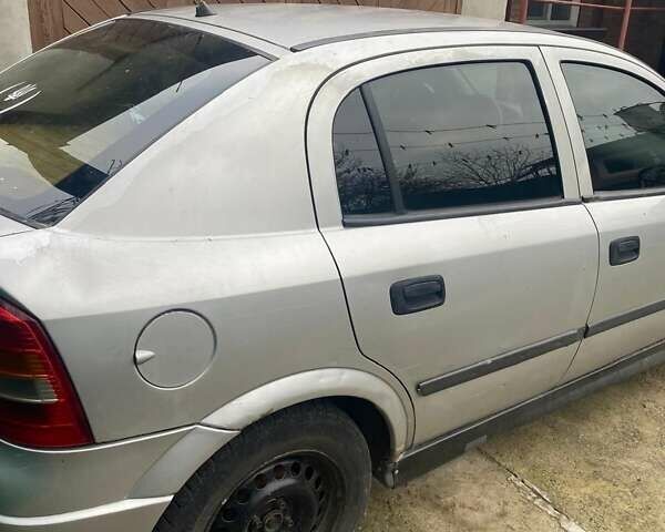 Серый Опель Астра, объемом двигателя 1.7 л и пробегом 197 тыс. км за 1500 $, фото 2 на Automoto.ua