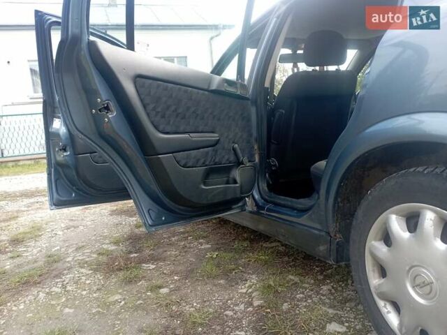 Серый Опель Астра, объемом двигателя 1.6 л и пробегом 193 тыс. км за 3400 $, фото 24 на Automoto.ua