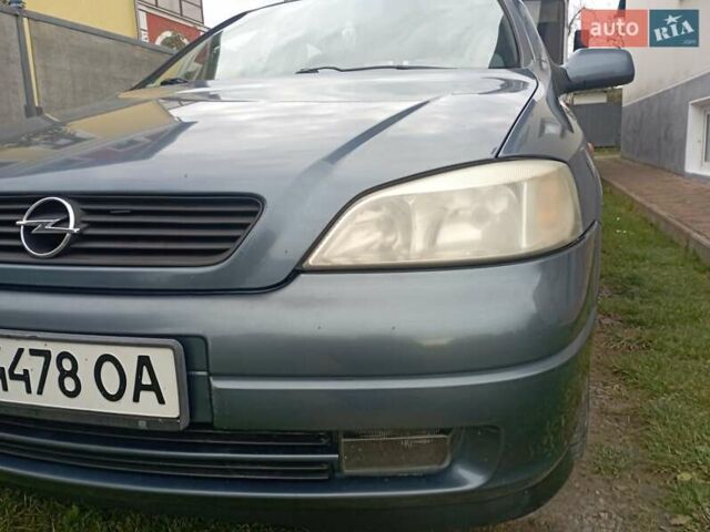 Серый Опель Астра, объемом двигателя 1.6 л и пробегом 193 тыс. км за 3400 $, фото 4 на Automoto.ua