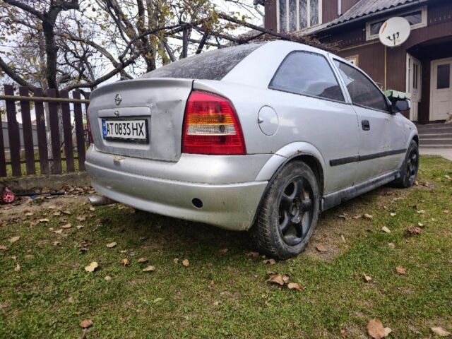 Серый Опель Астра, объемом двигателя 1.6 л и пробегом 400 тыс. км за 750 $, фото 5 на Automoto.ua