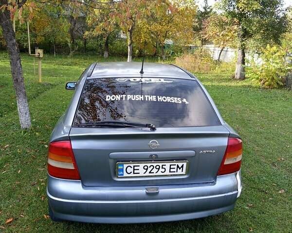 Серый Опель Астра, объемом двигателя 1.4 л и пробегом 425 тыс. км за 2300 $, фото 3 на Automoto.ua