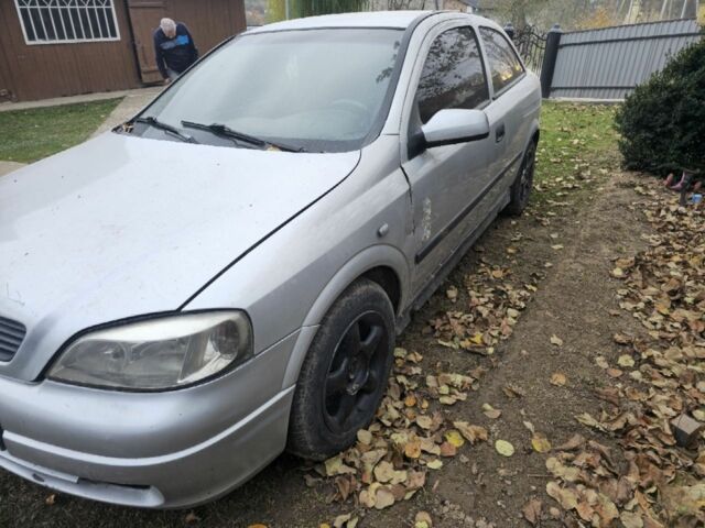 Серый Опель Астра, объемом двигателя 1.6 л и пробегом 400 тыс. км за 750 $, фото 3 на Automoto.ua