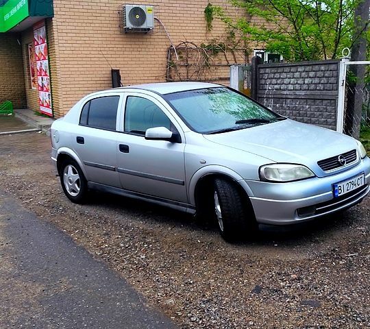 Сірий Опель Астра, об'ємом двигуна 2 л та пробігом 299 тис. км за 3100 $, фото 2 на Automoto.ua