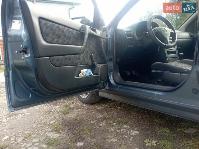 Серый Опель Астра, объемом двигателя 1.6 л и пробегом 193 тыс. км за 3400 $, фото 25 на Automoto.ua