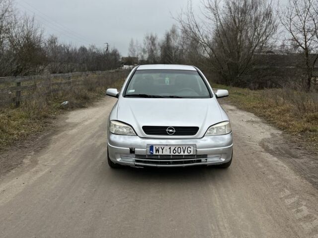 Серый Опель Астра, объемом двигателя 1.6 л и пробегом 240 тыс. км за 870 $, фото 1 на Automoto.ua