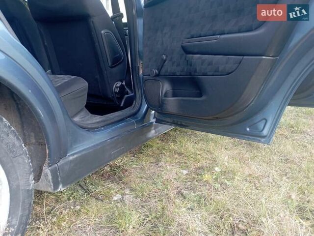 Серый Опель Астра, объемом двигателя 1.6 л и пробегом 193 тыс. км за 3400 $, фото 28 на Automoto.ua