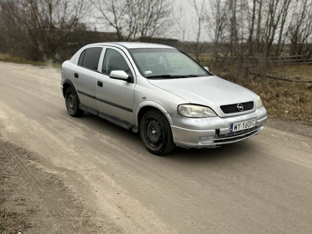 Серый Опель Астра, объемом двигателя 1.6 л и пробегом 240 тыс. км за 870 $, фото 3 на Automoto.ua