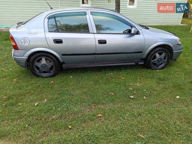 Серый Опель Астра, объемом двигателя 1.4 л и пробегом 425 тыс. км за 2300 $, фото 1 на Automoto.ua