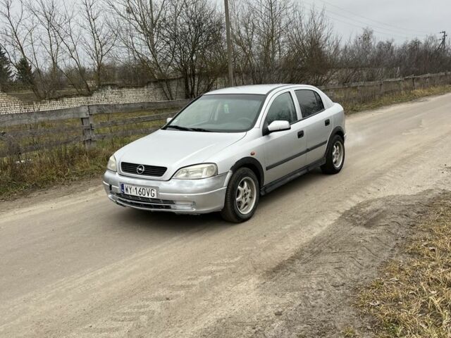 Серый Опель Астра, объемом двигателя 1.6 л и пробегом 240 тыс. км за 870 $, фото 2 на Automoto.ua