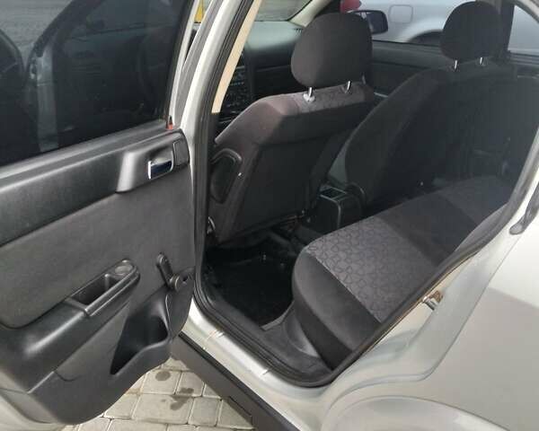 Серый Опель Астра, объемом двигателя 1.6 л и пробегом 270 тыс. км за 3500 $, фото 4 на Automoto.ua