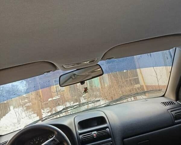 Серый Опель Астра, объемом двигателя 1.6 л и пробегом 219 тыс. км за 3000 $, фото 4 на Automoto.ua