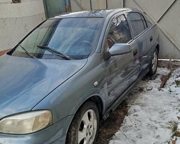 Серый Опель Астра, объемом двигателя 1.6 л и пробегом 219 тыс. км за 3000 $, фото 1 на Automoto.ua