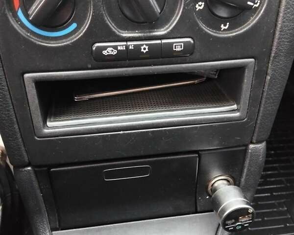 Серый Опель Астра, объемом двигателя 1.6 л и пробегом 270 тыс. км за 3500 $, фото 11 на Automoto.ua