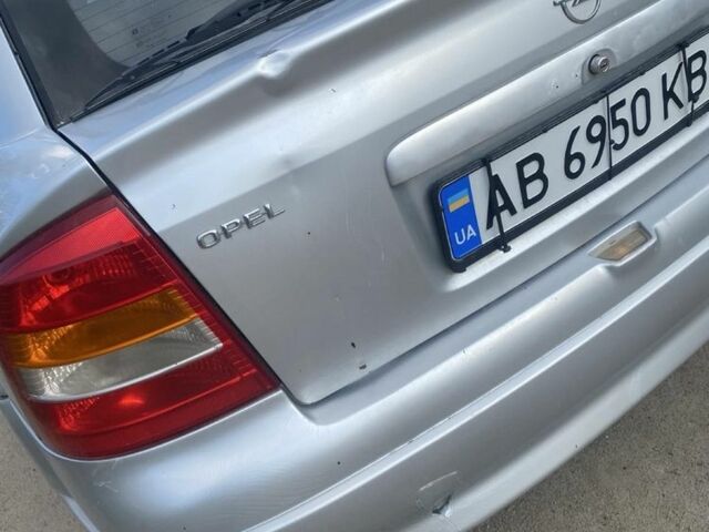 Серый Опель Астра, объемом двигателя 1.4 л и пробегом 15 тыс. км за 2200 $, фото 7 на Automoto.ua