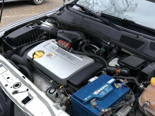 Серый Опель Астра, объемом двигателя 1.4 л и пробегом 400 тыс. км за 2200 $, фото 4 на Automoto.ua