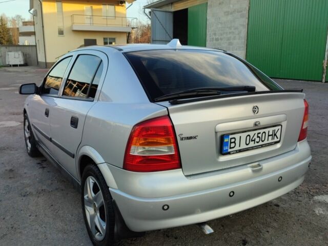 Серый Опель Астра, объемом двигателя 1.8 л и пробегом 156 тыс. км за 4200 $, фото 2 на Automoto.ua