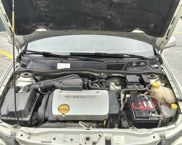 Серый Опель Астра, объемом двигателя 1.6 л и пробегом 270 тыс. км за 3500 $, фото 6 на Automoto.ua