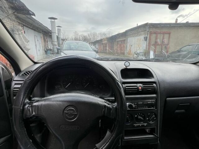 Серый Опель Астра, объемом двигателя 1.6 л и пробегом 368 тыс. км за 1183 $, фото 5 на Automoto.ua