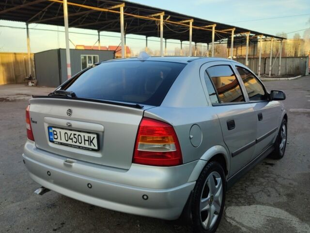 Серый Опель Астра, объемом двигателя 1.8 л и пробегом 156 тыс. км за 4200 $, фото 3 на Automoto.ua