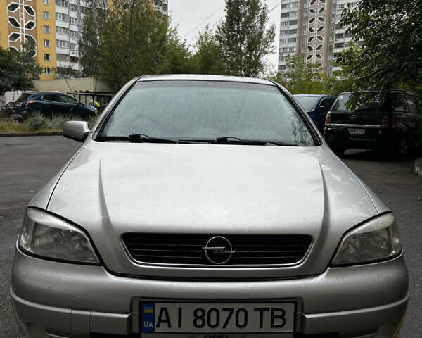 Серый Опель Астра, объемом двигателя 1.8 л и пробегом 229 тыс. км за 4200 $, фото 1 на Automoto.ua