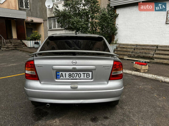 Серый Опель Астра, объемом двигателя 1.8 л и пробегом 229 тыс. км за 4200 $, фото 3 на Automoto.ua