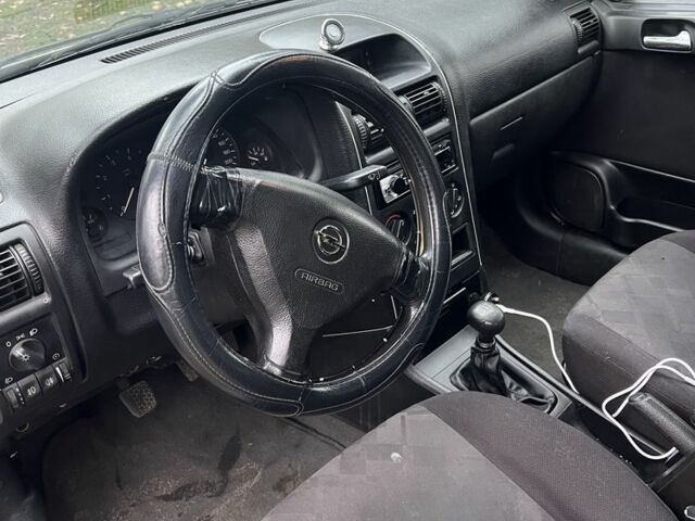 Серый Опель Астра, объемом двигателя 1.6 л и пробегом 368 тыс. км за 1650 $, фото 8 на Automoto.ua