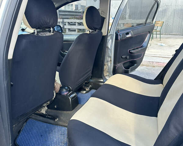 Серый Опель Астра, объемом двигателя 1.6 л и пробегом 380 тыс. км за 2000 $, фото 14 на Automoto.ua