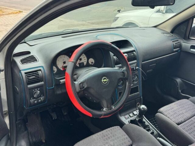 Серый Опель Астра, объемом двигателя 1.8 л и пробегом 300 тыс. км за 1199 $, фото 8 на Automoto.ua