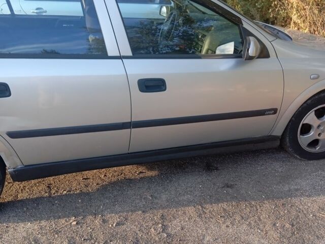 Серый Опель Астра, объемом двигателя 1.6 л и пробегом 337 тыс. км за 1771 $, фото 3 на Automoto.ua