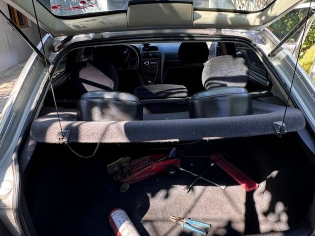 Серый Опель Астра, объемом двигателя 2 л и пробегом 360 тыс. км за 3600 $, фото 2 на Automoto.ua