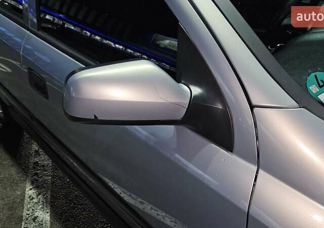 Серый Опель Астра, объемом двигателя 2 л и пробегом 341 тыс. км за 4000 $, фото 17 на Automoto.ua