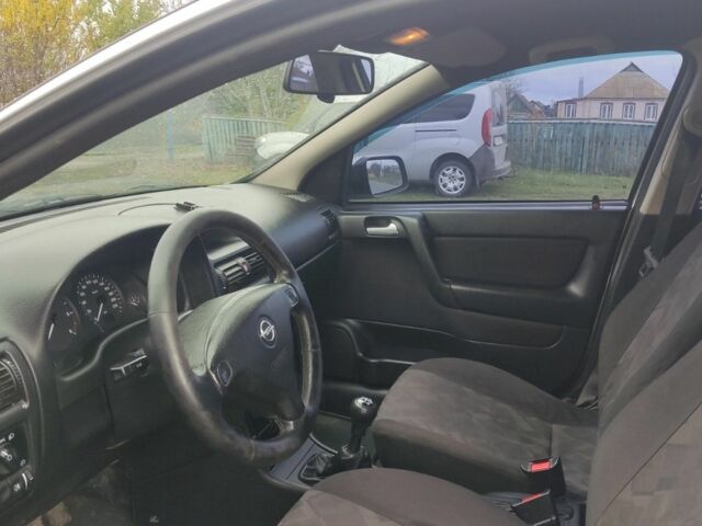 Серый Опель Астра, объемом двигателя 2 л и пробегом 200 тыс. км за 3000 $, фото 6 на Automoto.ua