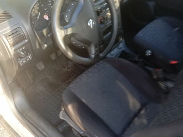 Серый Опель Астра, объемом двигателя 1.6 л и пробегом 337 тыс. км за 1771 $, фото 2 на Automoto.ua