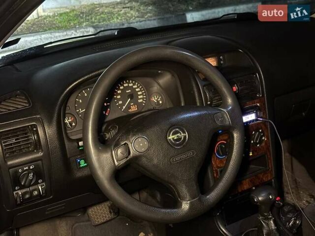 Серый Опель Астра, объемом двигателя 1.6 л и пробегом 453 тыс. км за 2000 $, фото 15 на Automoto.ua