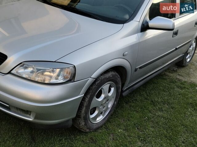 Серый Опель Астра, объемом двигателя 1.6 л и пробегом 240 тыс. км за 3000 $, фото 4 на Automoto.ua