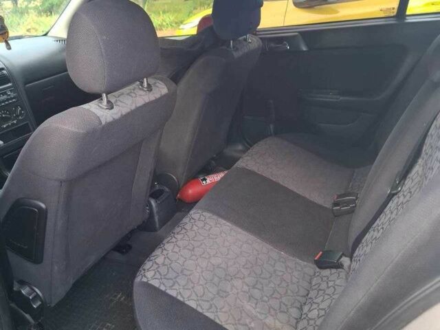 Серый Опель Астра, объемом двигателя 1.6 л и пробегом 2 тыс. км за 1500 $, фото 2 на Automoto.ua