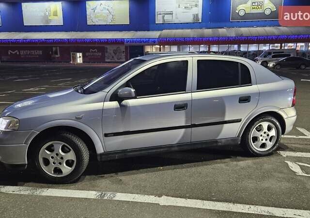 Серый Опель Астра, объемом двигателя 2 л и пробегом 341 тыс. км за 4000 $, фото 2 на Automoto.ua