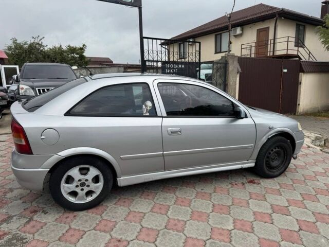 Серый Опель Астра, объемом двигателя 1.8 л и пробегом 300 тыс. км за 1199 $, фото 7 на Automoto.ua