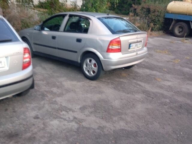 Серый Опель Астра, объемом двигателя 1.6 л и пробегом 337 тыс. км за 1771 $, фото 1 на Automoto.ua