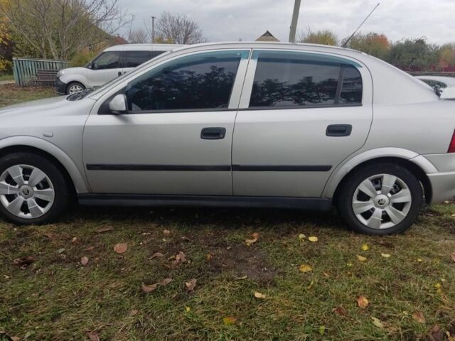 Серый Опель Астра, объемом двигателя 2 л и пробегом 200 тыс. км за 3000 $, фото 1 на Automoto.ua