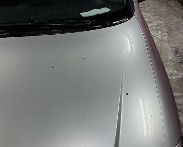 Серый Опель Астра, объемом двигателя 1.6 л и пробегом 453 тыс. км за 2000 $, фото 5 на Automoto.ua