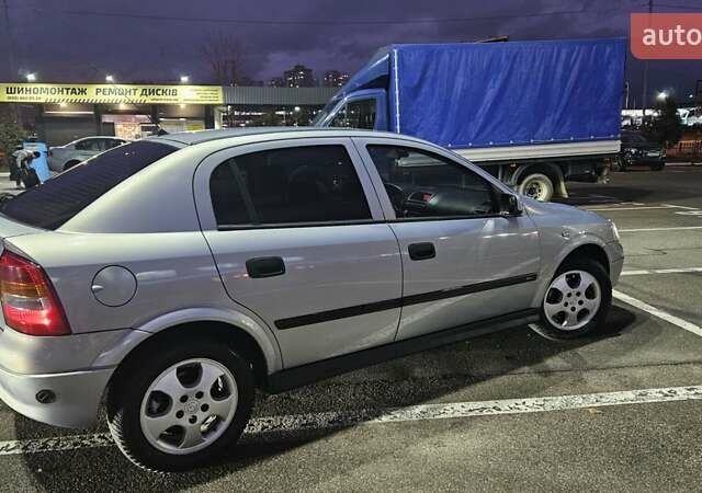 Серый Опель Астра, объемом двигателя 2 л и пробегом 341 тыс. км за 4000 $, фото 4 на Automoto.ua