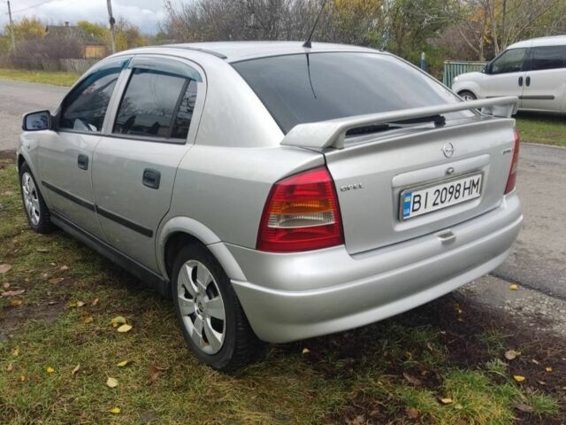 Серый Опель Астра, объемом двигателя 2 л и пробегом 200 тыс. км за 3000 $, фото 5 на Automoto.ua