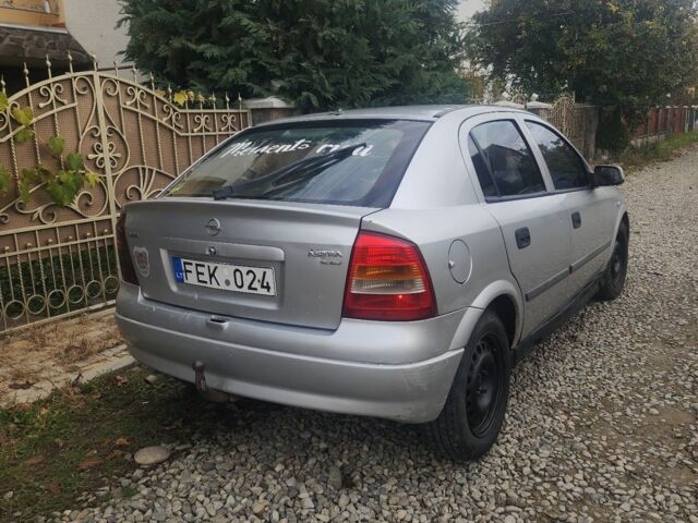 Серый Опель Астра, объемом двигателя 2 л и пробегом 300 тыс. км за 980 $, фото 3 на Automoto.ua